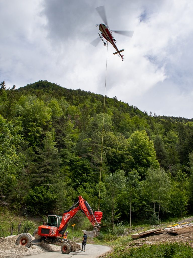 helicopter picking up gravel